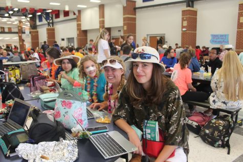From right to left:  Madi McGuire, Lexi Kaiser, Lexi Guffey, and Juhaina Aarda show off their spirit for school by dressing as tacky tourists.