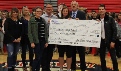 Liberty received a $10,000 check for winning the safe driver pledge