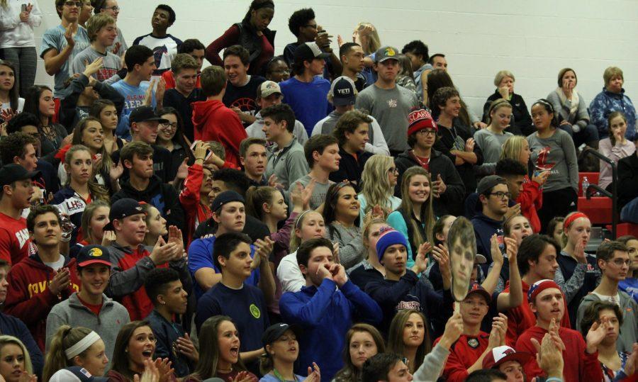 The crowd makes sure the boys on the court stay up and energize. 