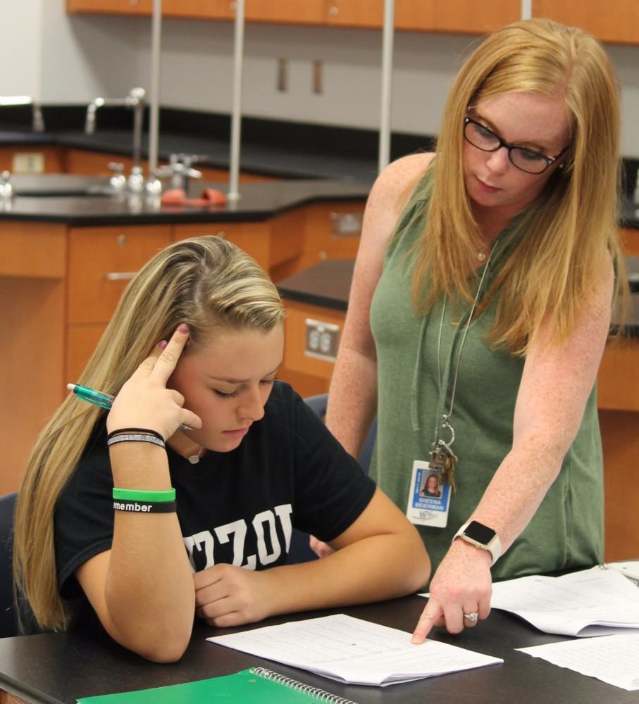 Students, like sophomore Katelyn Reichle, can receive help from teachers  on homework during class instead of finding time to ask them before class.