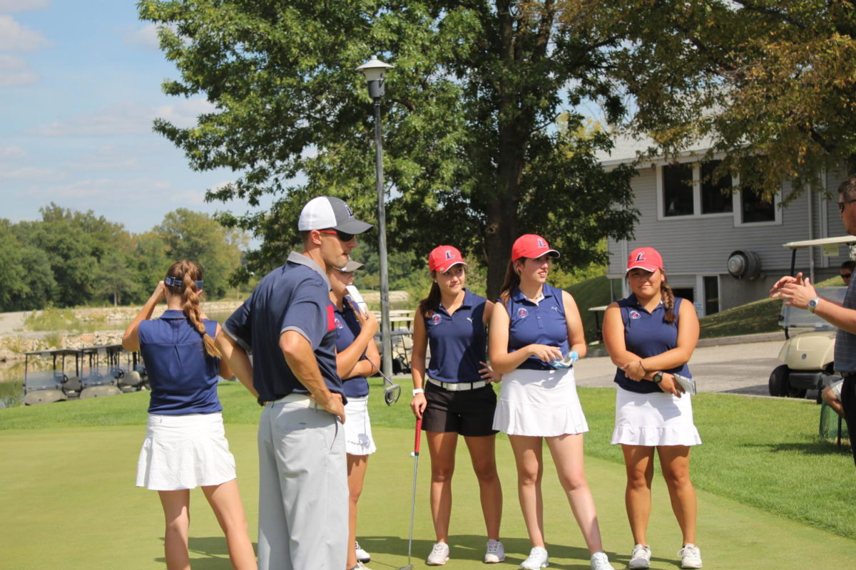 The girls golf team prepares for its match earlier in the season at the St. Peters Golf Club. The Eagles won their second-straight conference championship on Tuesday. 