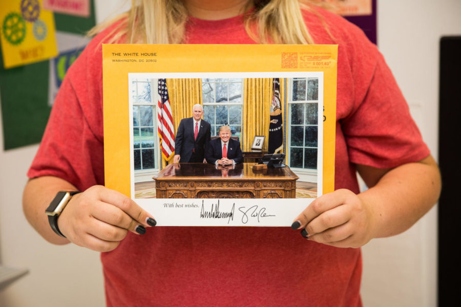 A signed picture of President Trump and Vice President Pence. 