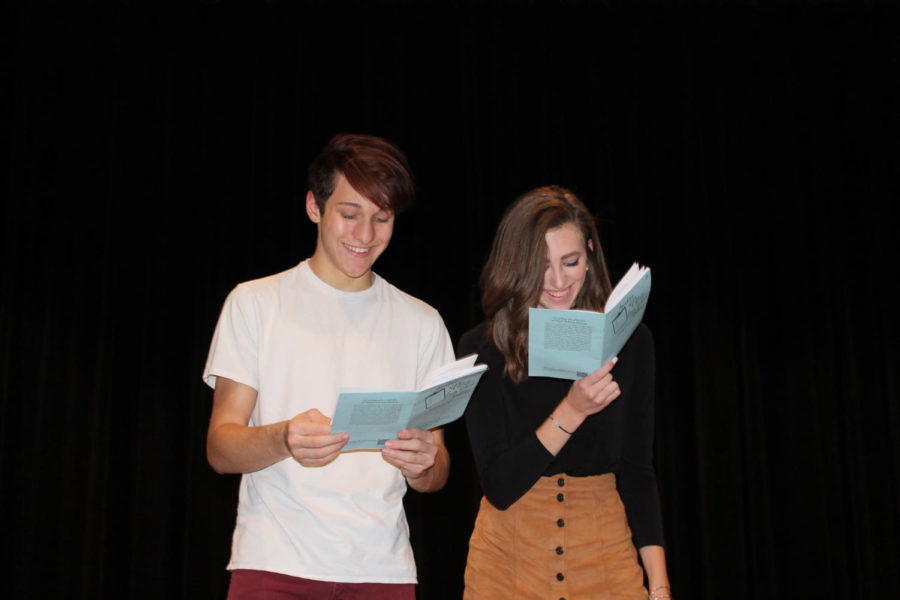 Junior Christian Tebeau and senior Alyssa Fay run through their lines for Act I of the play “Avoiding the Pitfalls of High School Dating”. Tebeau plays Lucky and Fay plays Starry. They are promoting their fail-proof dating system.