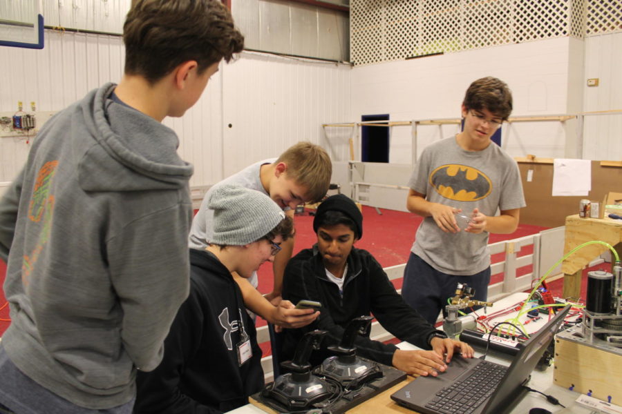 Ratchet Rockers Robotics students, review old work from their previous season.