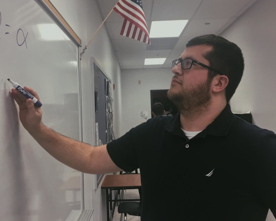 Mr. Leonard teaching one of his geometry classes.