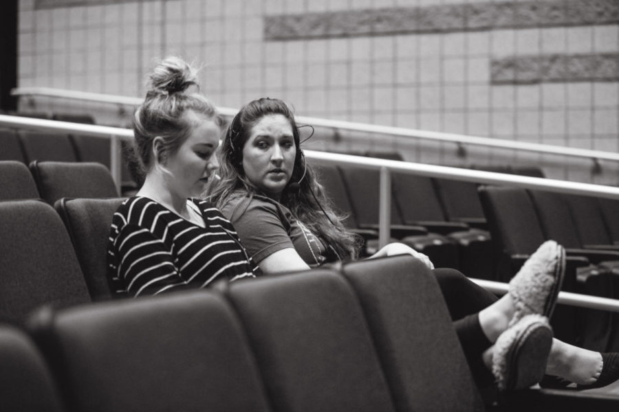 Mrs. Willis sits alongside student director Marlee Doniff as they work on the fall Night of Comedy.