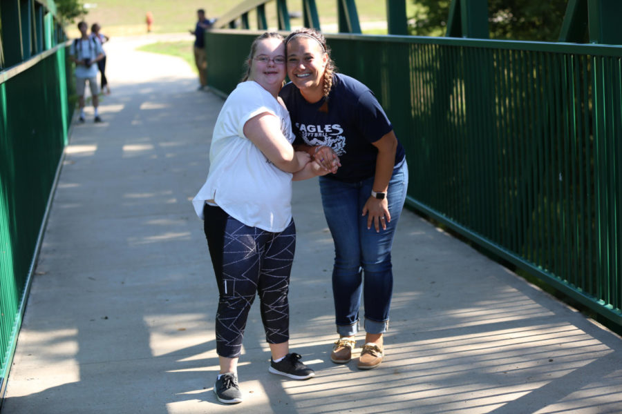 Ms. Albietz and Isabella Tegtmeier crossing the bridge on the first day of school.
