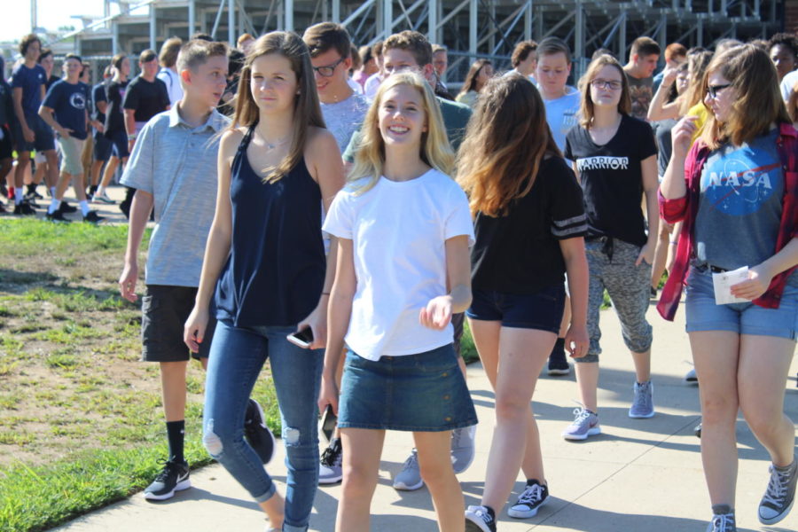 Freshman begin their walk across the bridge on the first day of school.