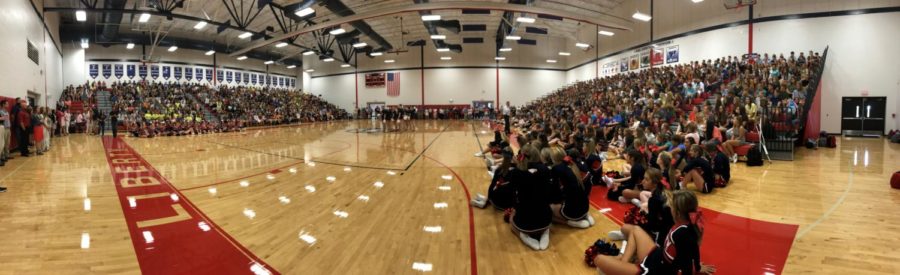 The gym is packed with all four grades on the first day to start the school year. 