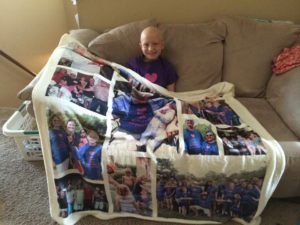 Keira Stout receives a blanket with some of her favorite memories.