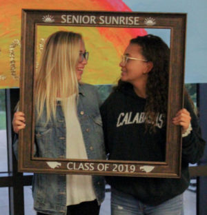 Left to right: Seniors Jaeda Lee and Savana Wiegand pose for the Senior Sunrise. It’s help bonded the seniors together and realize the amazing times that Liberty has given them. 