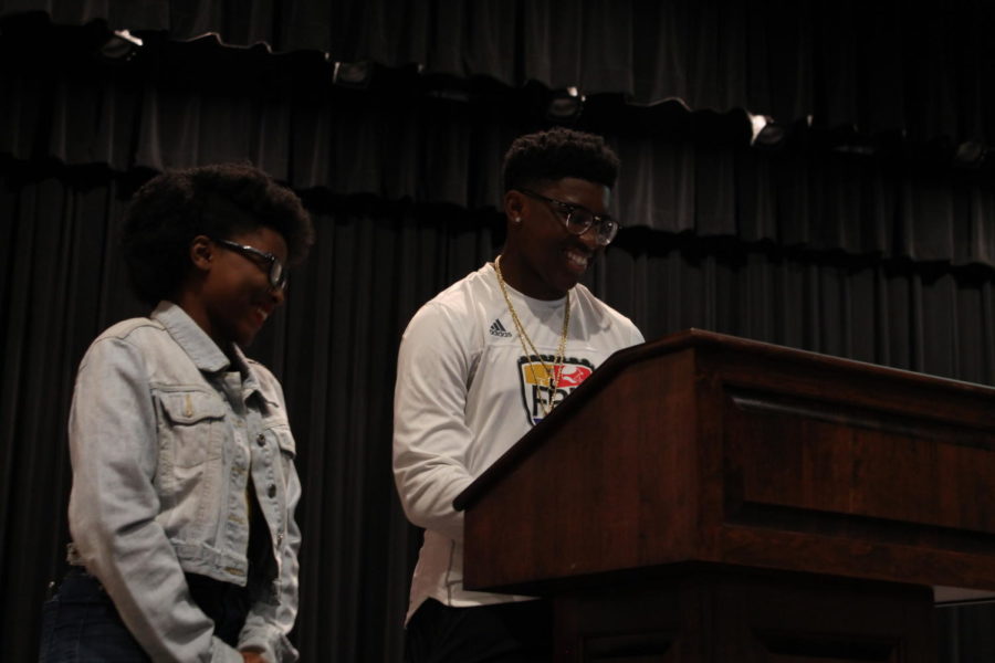 Juniors Aminah Lobster and Tai Williams inform students about what diversity club is.