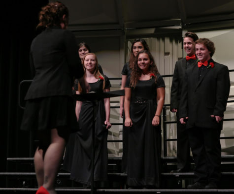 Emily Grant, Mya Waldren, Alison Flitter, Jaeda Lee, Dylan Taylor and Cole Allen perform as part of chamber choir at the fall choral concert. 