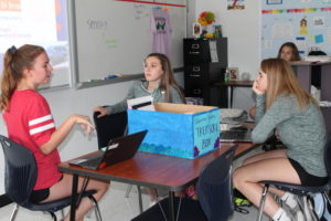 Educators Rising members Katie May, Halle Green and Megan Kruse discuss future plans.