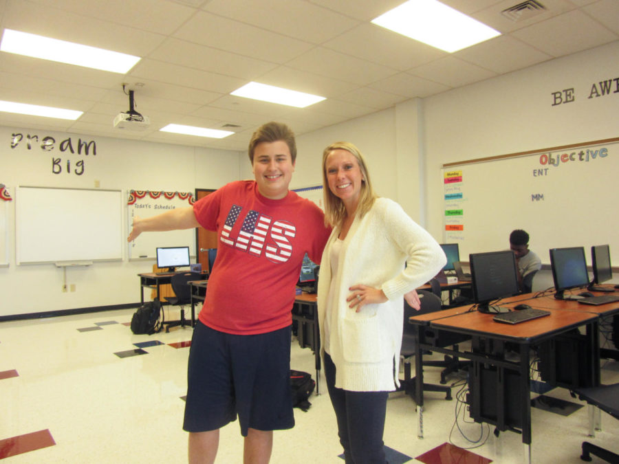 Sophomore Andrew Taylor and Ms. Muench pose for Taylors 7th hr picture for his Day in the Life project. 