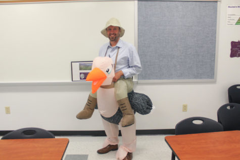 Mr. Barker poses in his costume chosen by the students. The proceeds from the costume contest will go towards Trick-or-Treating for UNICEF 2018. There are so many great teachers at Liberty doing so many fantastic things that I never expected to be chosen.  It was an honor, Barker said.