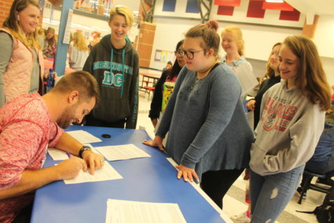 Olivia Overton and Kiersten Baumgartner lined up for an autograph from Mr. Schapers turkey campaign.