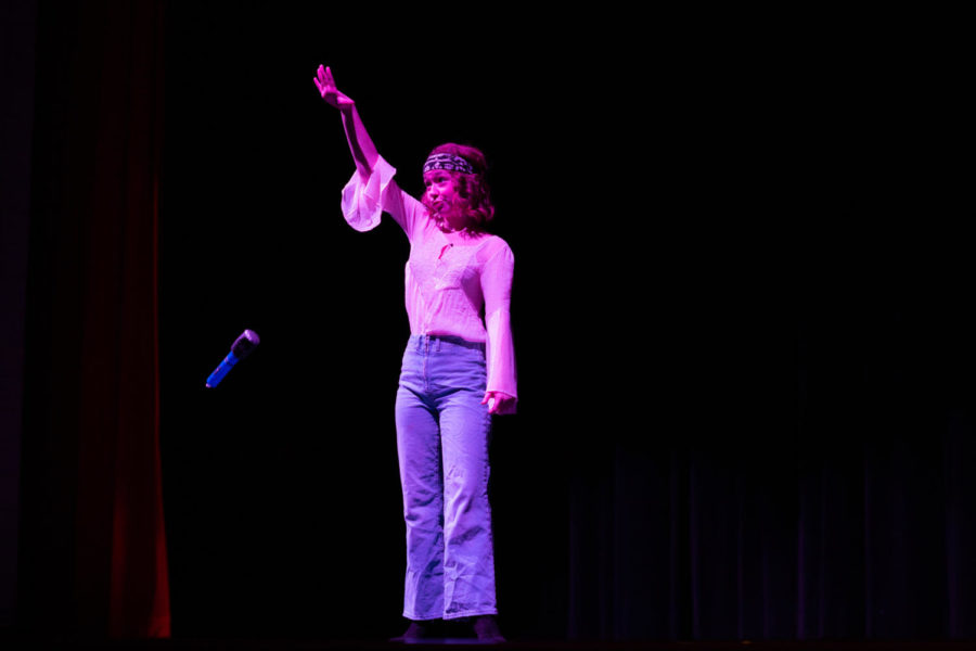 Junior Annette Oliphant  drops the mic. after performing “Mamma Mia.” She defeated her mother, Mrs. T.O., in Libertys  first ever lip sync battle. 