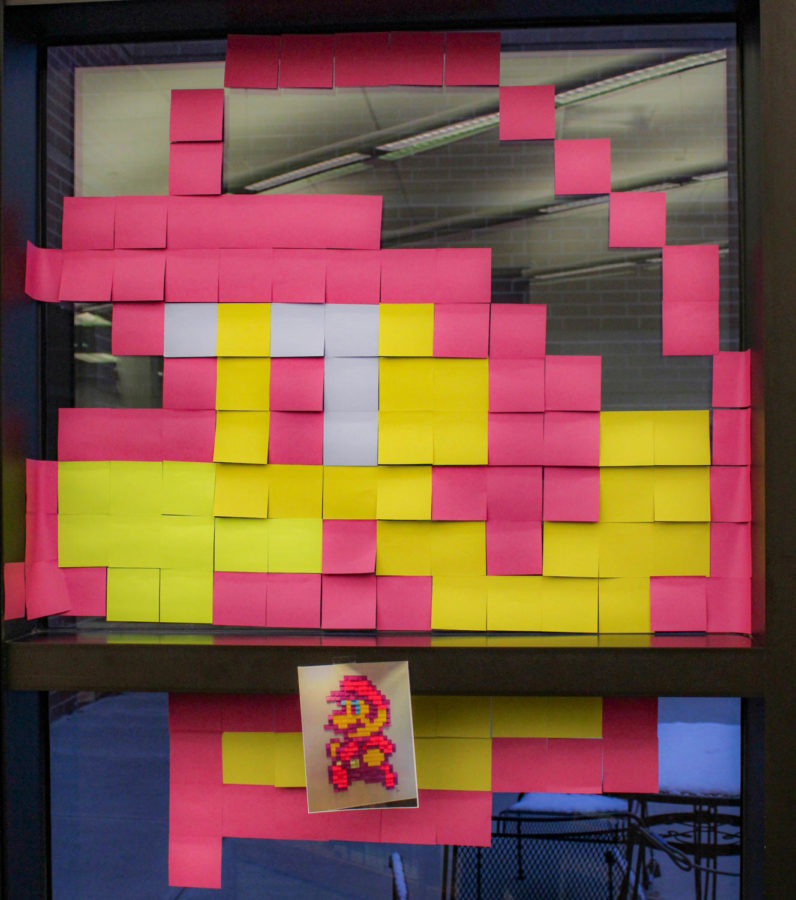 A pixel picture of Mario put together with post-it notes by Jordin Garey.