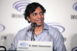 M. Night Shyamalan promotes Glass at a convention. He seemed optimistic about the ending of his very own superhero trilogy.