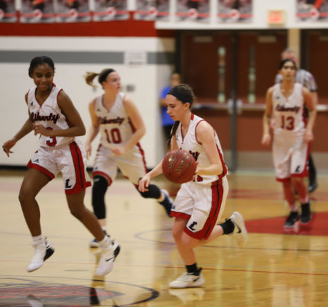 Sara Gordley dribbles down the court in a game at the Warrenton Tournament. 