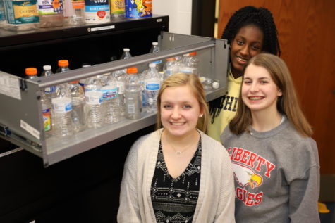 (Left to right) Aly Lough, Brianna Mills and Jade Moore went around the school and collected bottles for two weeks, for their FCCLA project. They  ended up with 100 bottles to be used for various future school projects. 