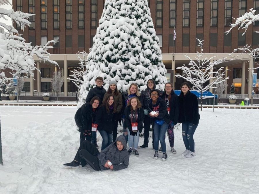 A+group+of+Liberty+thespians+spend+an+afternoon+in+the+snow+following+2019+ThesCon+in+Kansas+City.+Due+to+inclement+weather+conditions%2C+the+troupe+spent+an+extra+night+at+their+hotel.+What+started+as+a+change+of+plans+led+to+a+conference-wide+snowball+fight%2C+creating+memories+Troupe+8211+will+never+forget.+