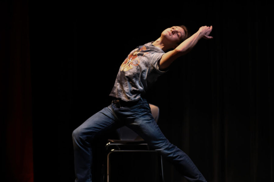Last year's winner, senior Christian Tebeau, is in the middle of his routine.