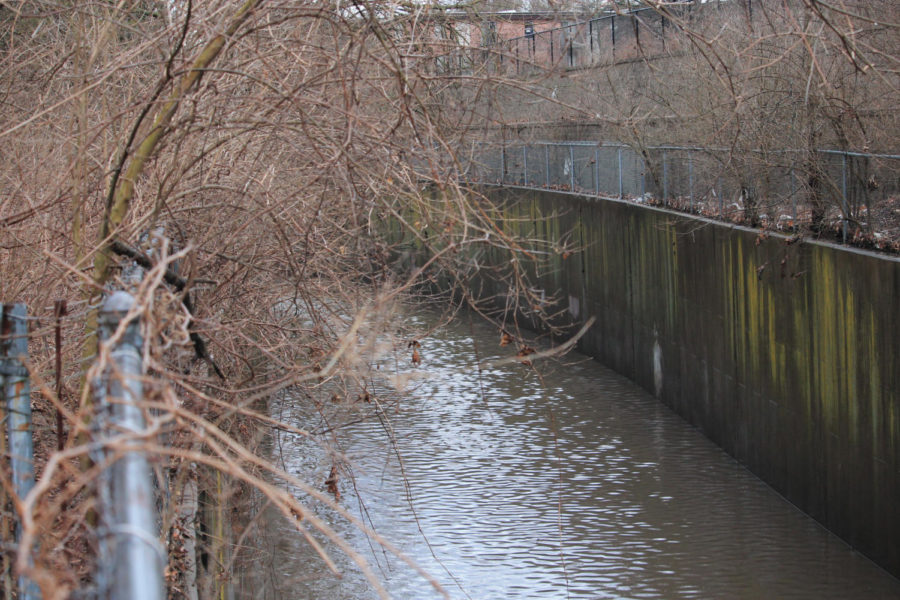 The wall built along the land connecting Coldwater Creek with East Humes Lane in Florissant.