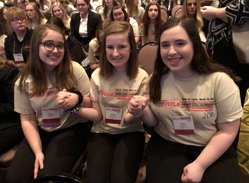 Emma Benesek, Audrey Chambers and Katelyn Yoder of FCCLA eagerly wait for placement results at the state competition.