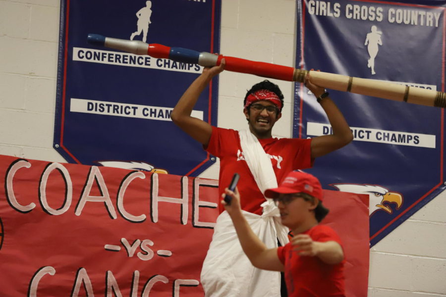 Rishi Kondapaneni carries on the tradition of parting the Red Sea at the Red Night basketball game. 