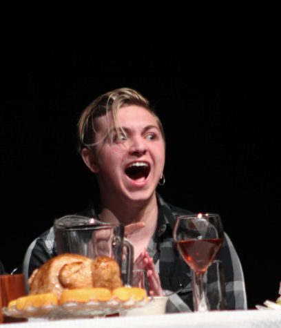 Junior Dylan Lindke as Jimmy from Jimmy the Antichrist laughs like a maniac with his family.