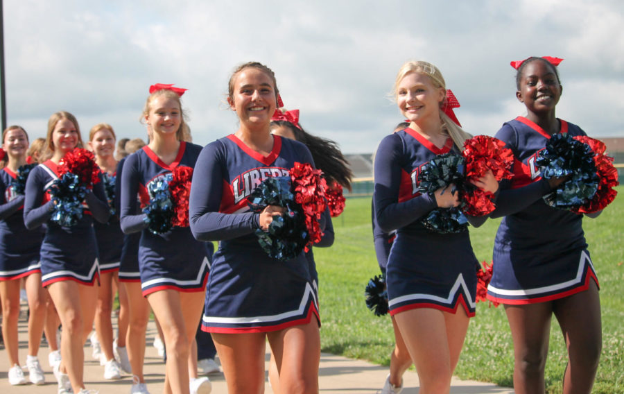 Freshmen cheerleaders lead the way for the freshman class in the annual bridgewalk. 