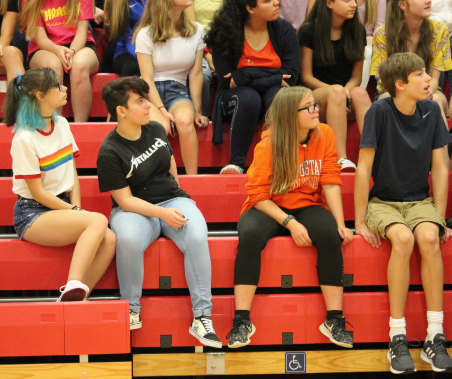 (left to right) Faith Barnes, Allison Apollo, Elektra Lowe and Vincent Jarus listen to Mr. Nelson as he encouraged freshmen to be respectful students while at Liberty. 