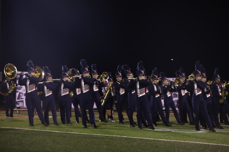 The marching band in action during the varsity football game against Troy.