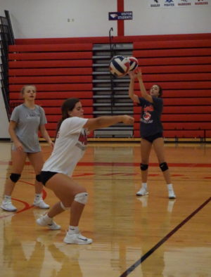 The girls volleyball team practices leading up to the regular season that began Sept. 3.