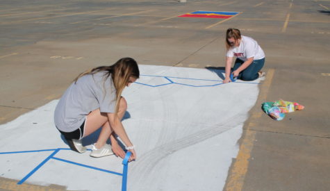 Sarah Rowley and her friend design her parking spot.