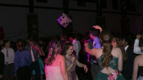 Party-goers enjoy themselves while dancing together
