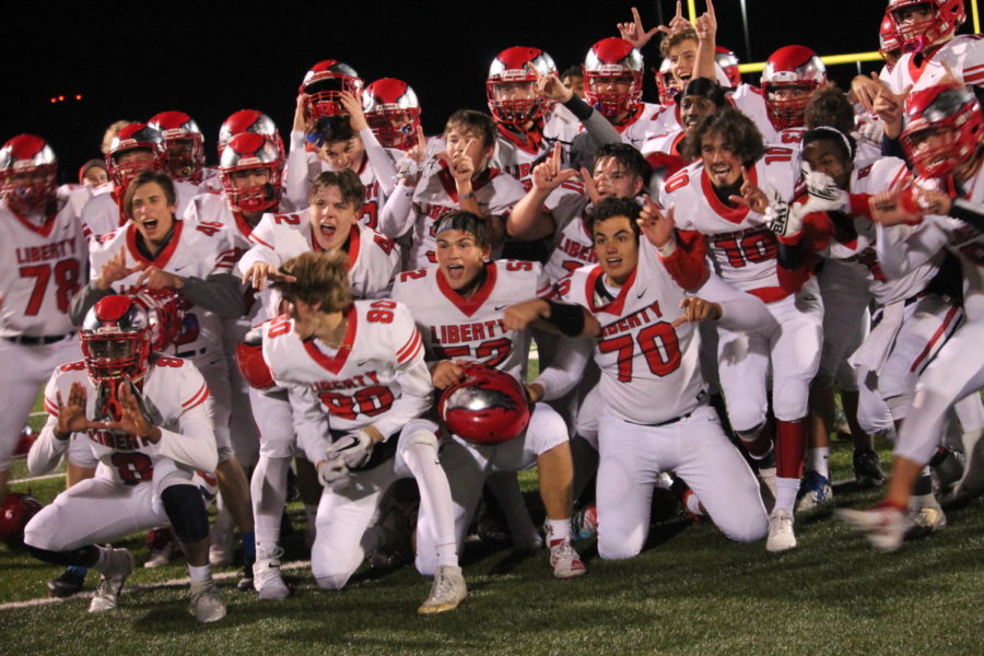 The varsity football team completed its regular season with a come-from-behind 42-32 victory at Holt. 