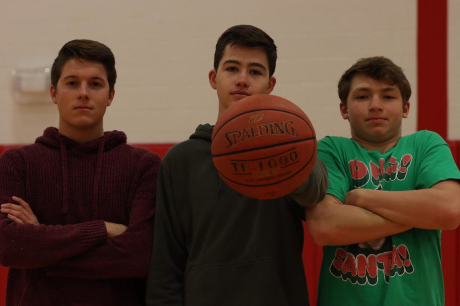 Zach+Kerns%2C+Jonas+McCaffrey+and+Ben+Ptasienski+worked+together+to+establish+the+Koi+basketball+team.+
