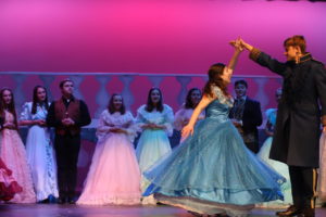 Cinderella (Michelle Yoder) dances with Prince Topher (Wesley Nichols) at the ball.