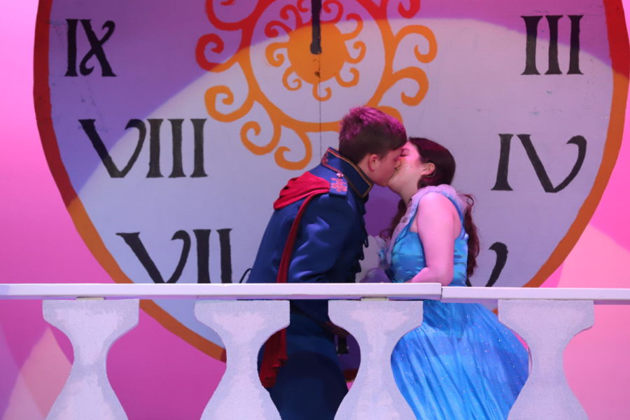 Wesley Nichols and Michelle Yoder share a kiss as their characters Prince Topher and Cinderella. 