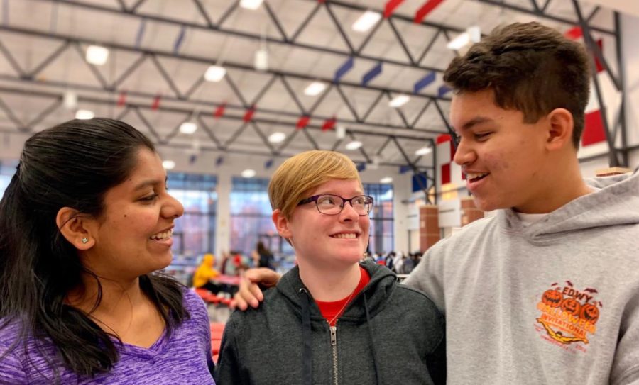 Sanjana Anand (left) and Jaden Zelidon (right) remind their friend Anna Morrison how much she means to them.
