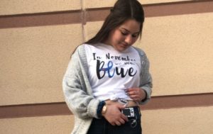 Athena Widlacki is a proud diabetic as she looks down at her glucose monitor. 