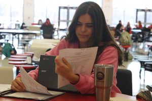 Meghan McVey studies for finals at StuCos Cookies Cocoa & Cramming