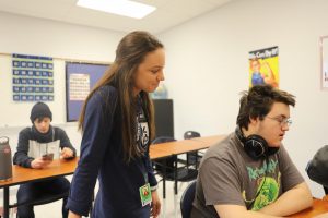 Ms. Stellhorn helps freshman Nathan Hanks in first hour geography. Stellhorn is a new member of the LHS teaching staff.