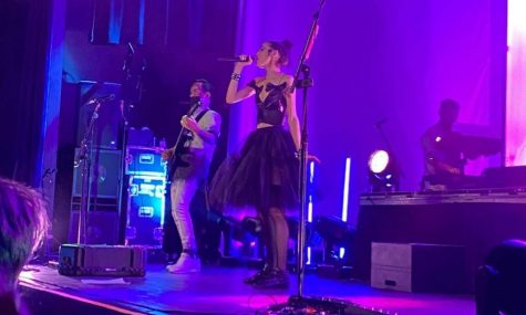 Poppy on stage singing at Delmar Hall on Feb. 15.
