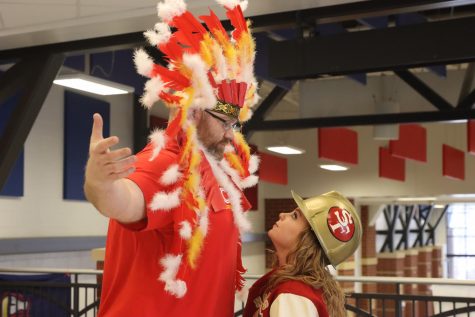Mr. Barnes (Chiefs fan) and Ms. Beierman (49ers fan) face off against each other for Super Bowl 54.