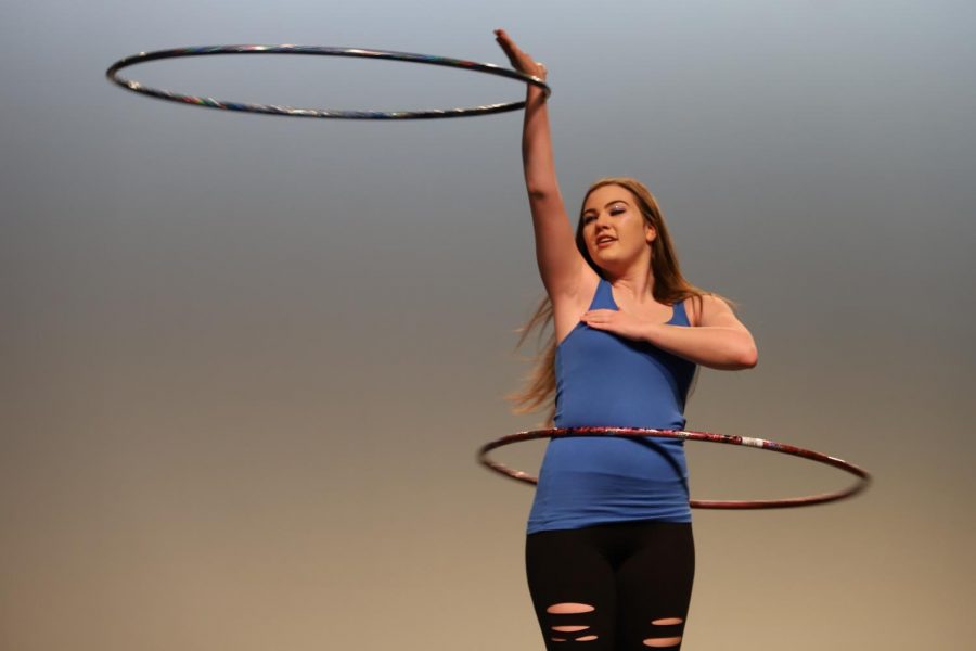 Summer White impresses the judges with her intricate hooping routine.