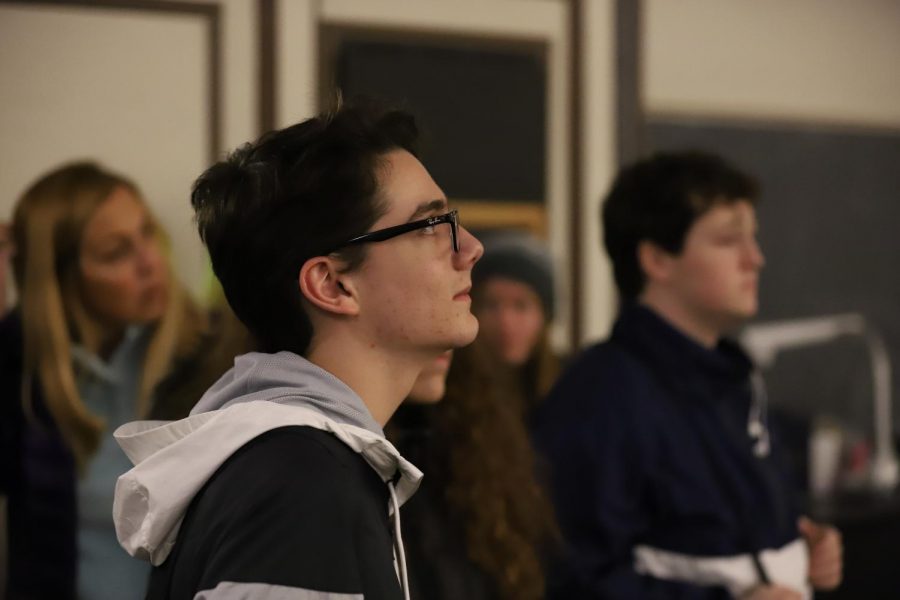 Rhett Cunningham views one of the lecture halls in the journalism building.